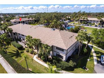 A lovely aerial view of this condo community and surrounding foliage at 1515 Forrest Nelson Blvd # D103, Port Charlotte, FL 33952