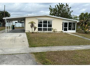 Ranch style home with carport and spacious yard at 21242 Glendale Ave, Port Charlotte, FL 33952