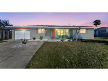 Ranch-style home with carport, landscaped yard, and charming facade at 537 Shamrock Blvd, Venice, FL 34293