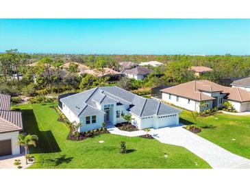 Luxury home with tile roof, pool, and large yard; located in a desirable neighborhood at 22 Windward Rd, Placida, FL 33946