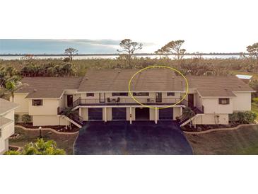 Ground level condo with attached garage and waterfront views at 4260 Placida Rd # 12C, Englewood, FL 34224