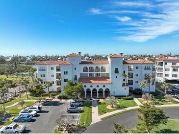 Luxury condo building with waterfront views and ample parking at 11200 Hacienda Del Mar Blvd # 201, Placida, FL 33946