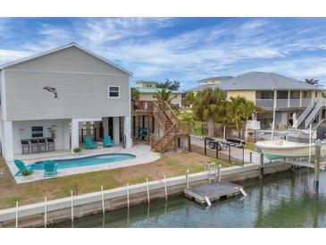 Waterfront home with private pool and boat dock at 10451 Sherman St, Englewood, FL 34224