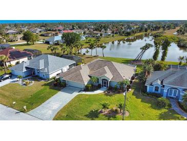 Single Gathering home on a waterfront lot at 8 Sportsman Rd, Rotonda West, FL 33947