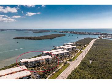 Waterfront condo building with beautiful ocean views from every unit and convenient road access for easy travel at 1591 Beach Rd # 403, Englewood, FL 34223