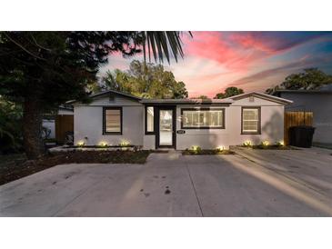 Updated bungalow with modern exterior and a paved driveway at 1212 59Th S St, Gulfport, FL 33707