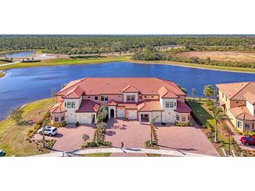Luxury waterfront townhome community; waterfront property with lake views at 10217 Staggerbush Dr # 202, Venice, FL 34293