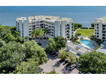Waterfront condo building with pool and parking at 2020 Harbourside Dr # 424, Longboat Key, FL 34228