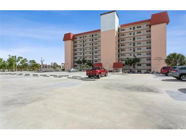 Ample parking lot with spaces for residents and visitors at 244 Saint Augustine Ave # 107, Venice, FL 34285