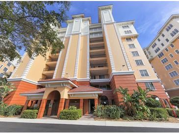 Attractive multi-story building with balconies and landscaping at 157 Tampa E Ave # 407, Venice, FL 34285