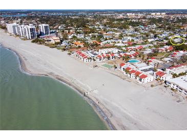 Aerial view of beachfront property showing home near beach and other homes at 500 Park S Blvd # 7, Venice, FL 34285