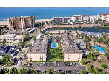 Beautiful beach condo complex with a shared pool and stunning ocean views at 995 Laguna Drive # 303, Venice, FL 34285