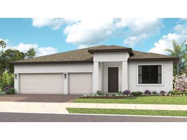 Beautiful one-story home with three-car garage and landscaping at 14451 Coastal Woodland Ln, Parrish, FL 34219