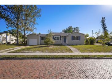 Updated bungalow with a charming front porch and brick driveway at 5340 5Th S Ave, St Petersburg, FL 33707