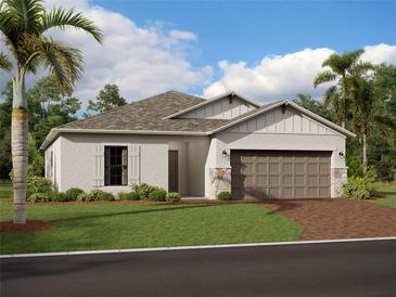 One-story home with light stucco exterior, brown garage door, and landscaping at 9840 Last Light Gln, Parrish, FL 34219