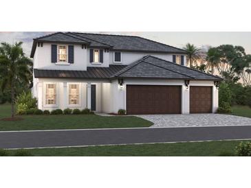 Two-story home with a two-car garage, dark brown garage doors, and a light-grey exterior at 1668 Lugano Cir, North Venice, FL 34275