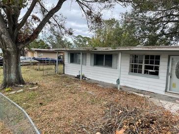 Ranch-style home with a spacious yard at 1716 Lancelot Loop, Tampa, FL 33619