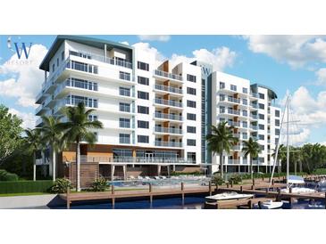 Modern multi-story building with water views and resort amenities at 411 E Shore Drive # 705, Clearwater Beach, FL 33767