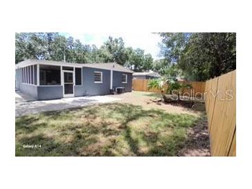 Renovated home with a fenced-in backyard at 4614 Webster St, Tampa, FL 33610