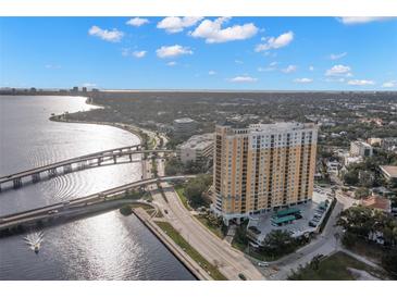 Aerial view of a high-rise building near the water, offering stunning city and water views at 345 Bayshore Blvd # 308, Tampa, FL 33606