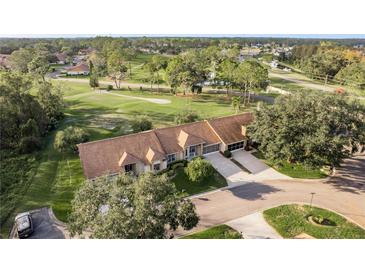 Aerial view of home on golf course community at 5935 Precious View Ct, New Port Richey, FL 34655