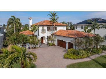 Stunning two-story home with tile roof and paver driveway at 158 Ramon Ne Way, St Petersburg, FL 33704