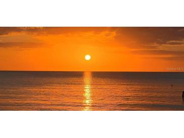 Stunning sunset over the ocean with a captivating view at 1390 Gulf Blvd # Ph-1, Clearwater Beach, FL 33767