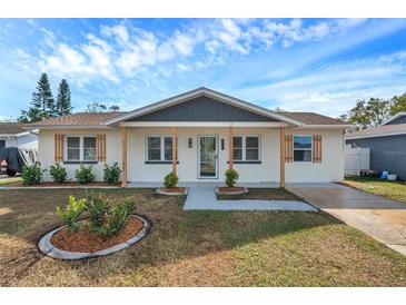 Updated exterior of charming single story home with landscaped yard at 9126 109Th Ter, Seminole, FL 33777