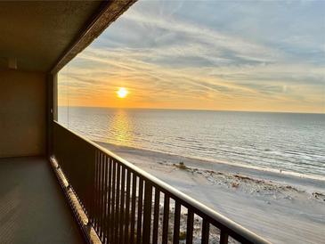 Stunning sunset over ocean from balcony at 1290 Gulf Blvd # 1702, Clearwater Beach, FL 33767