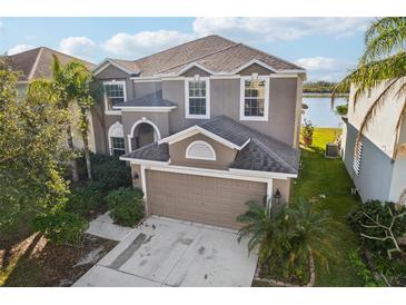 Two story house with lake view and attached garage at 526 19Th Nw St, Ruskin, FL 33570