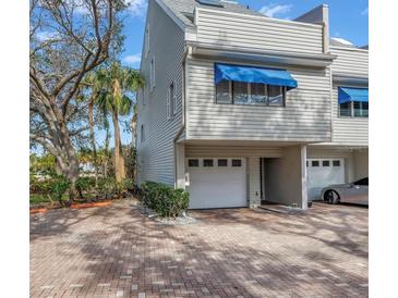 Updated condo with attached garage and paved driveway at 1355 Pinellas Bayway S # 23, Tierra Verde, FL 33715