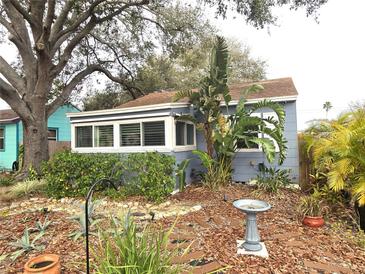 Charming bungalow with mature landscaping and a bird bath at 143 44Th N Ave, St Petersburg, FL 33703