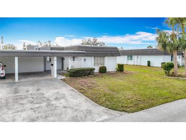 Updated condo with carport and well-manicured lawn at 3932 Ashwood Ln # 42, Sarasota, FL 34232