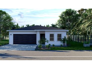 Modern house with dark brown garage door and white exterior at 4226 Elwood Rd, Spring Hill, FL 34609