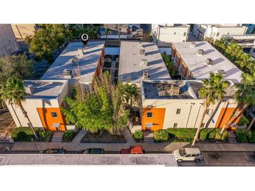 Aerial view of a modern townhome community with lush landscaping at 855 3Rd N Ave, St Petersburg, FL 33701