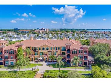 Aerial view of luxury condo building with water access at 2741 Via Cipriani # 930A, Clearwater, FL 33764