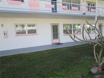 Exterior view of building showing entrance and landscaping at 5876 21St N St # 3, St Petersburg, FL 33714