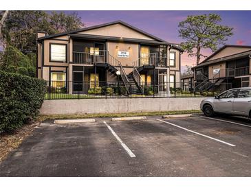 Two-story building with parking and landscaping at 3958 Dream Oak Pl # 104, Tampa, FL 33613