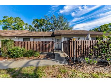 Updated condo with private fenced patio, great curb appeal at 1725 Pine Ridge E Way # E, Palm Harbor, FL 34684