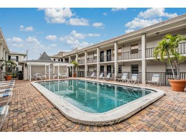 Refreshing community pool with ample deck space for lounging at 5221 Bayshore Blvd # 37, Tampa, FL 33611