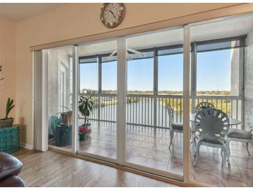 Spacious balcony with sliding glass doors offering scenic water views at 6450 Shoreline Dr # 9502, St Petersburg, FL 33708