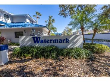 Watermark community entrance sign with landscaping at 1621 Watermark Ne Cir # 1621, St Petersburg, FL 33702