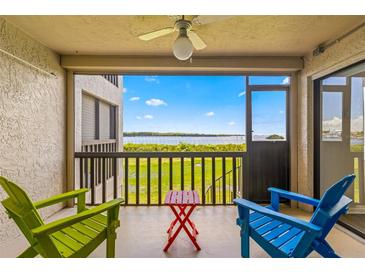 Relaxing balcony with waterfront view and seating at 1812 Mariner Dr # 137, Tarpon Springs, FL 34689