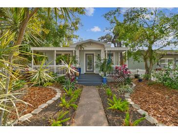 Charming bungalow with a welcoming front porch and beautifully landscaped yard at 2126 7Th N Ave, St Petersburg, FL 33713