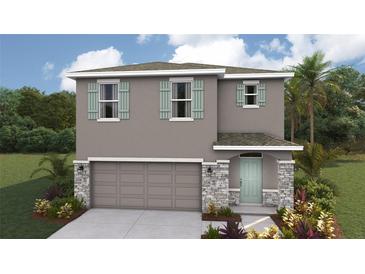 Two-story house with gray siding, stone accents, and a two-car garage at 3467 Hilltop Cir, Lakewood Ranch, FL 34211