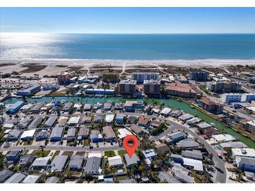 Aerial view showing home's location near the beach at 11435 2Nd E St, Treasure Island, FL 33706