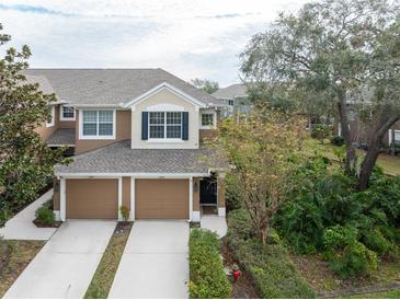 Two-story townhome with two-car garage and landscaped yard at 2044 Santa Catalina Ln Dr # 2044, Riverview, FL 33578