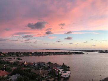Stunning aerial view of waterfront homes and peaceful sunset at 4900 Brittany S Dr # 1512, St Petersburg, FL 33715