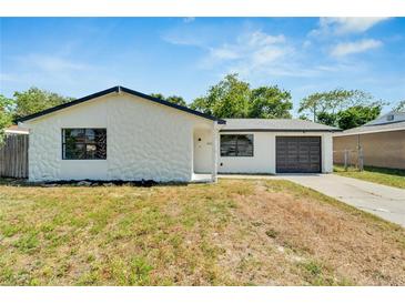 Charming single story home with a newly renovated exterior and landscaping at 6220 Westport Dr, Port Richey, FL 34668