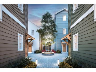 Attractive courtyard with charming landscaping and townhomes at 2550 1St N Ave, St Petersburg, FL 33713